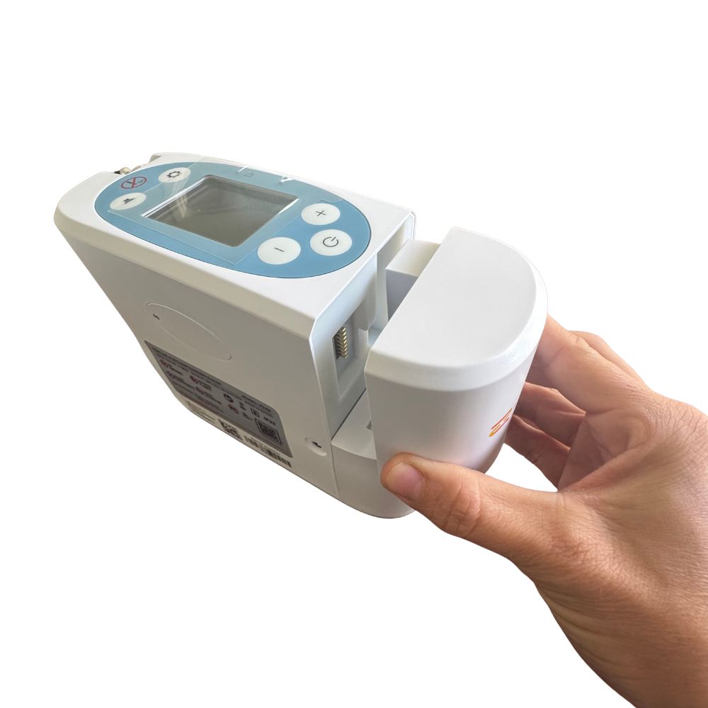 Rhythm P2-E6 con bateria recargable removible sostenido en la mano