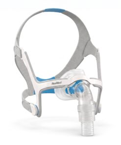 Marco InfinitySeal y codo con ventilación de la mascarilla nasal ResMed AirFit N20, vista lateral tres cuartos