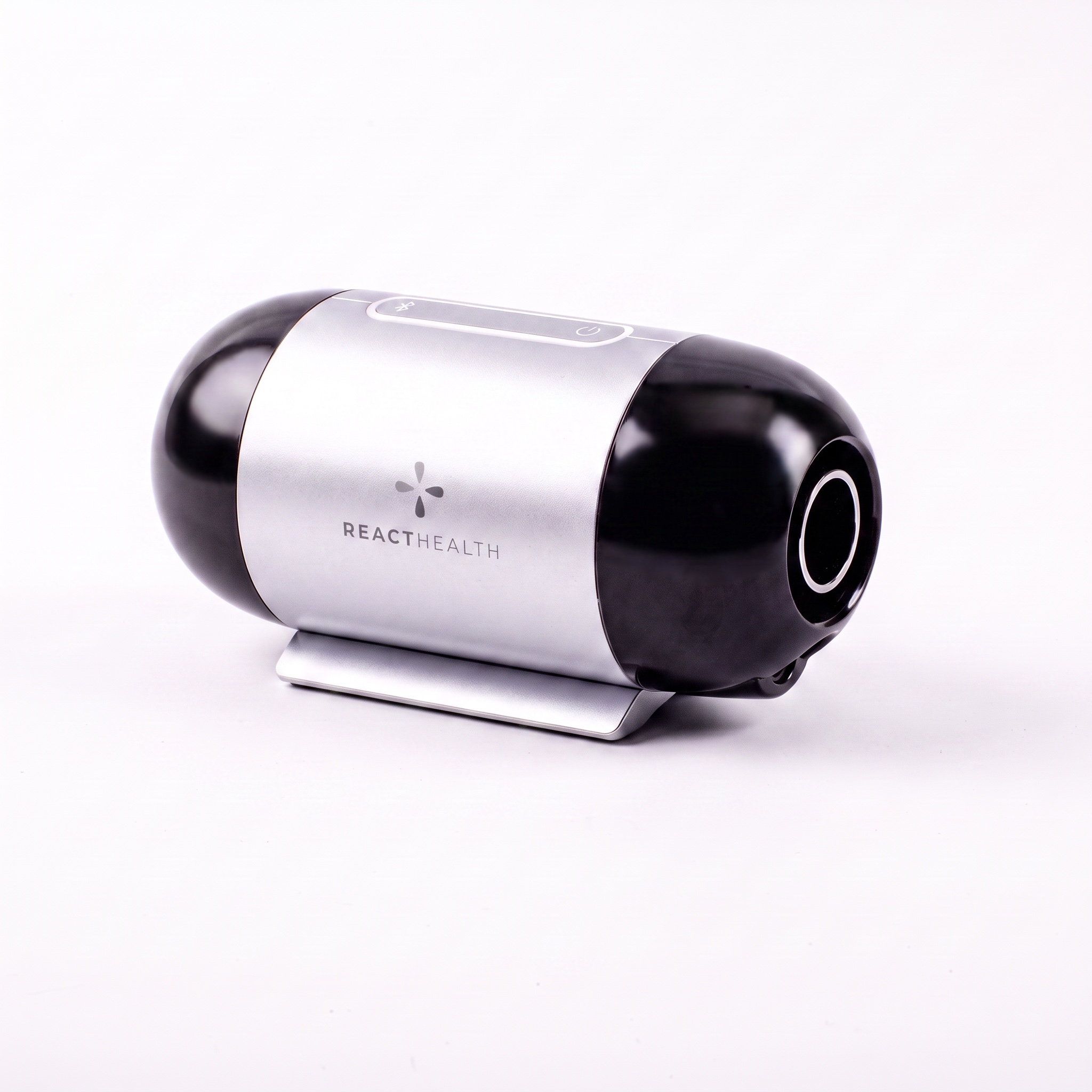 CPAP portátil de viaje React Health Luna TravelPAP, vista frontal con botón de encendido